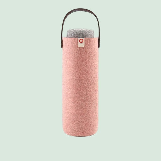 Baabuk blush pink felt wine bottle carrier with handle and grey felt coaster inside.