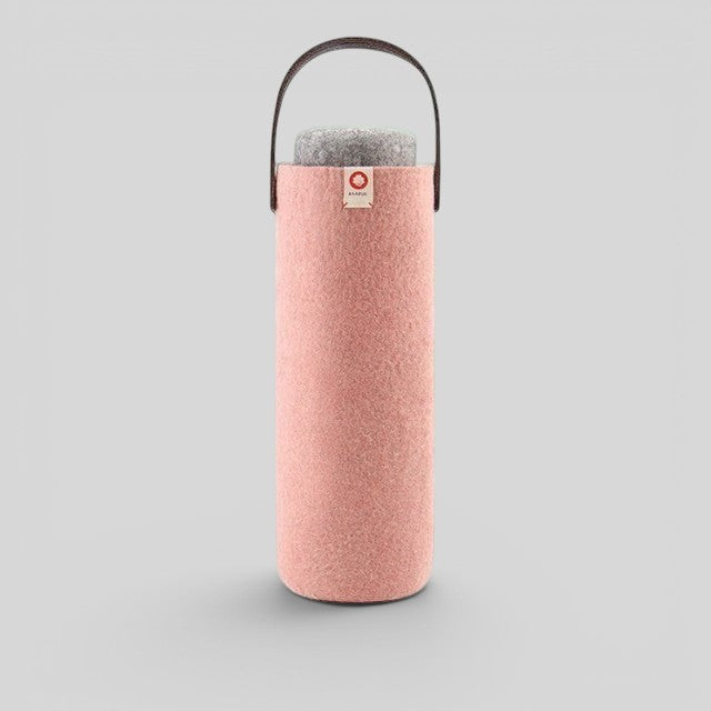 Baabuk blush pink felt wine bottle carrier with handle and grey felt coaster inside.